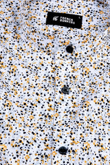 White with yellow and dark blue sprinkle printed shirt