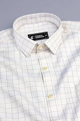 Light brown with dark blue arglye check shirt