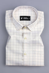 Light brown with dark blue arglye check shirt
