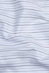 White with grey and black line stripe shirt